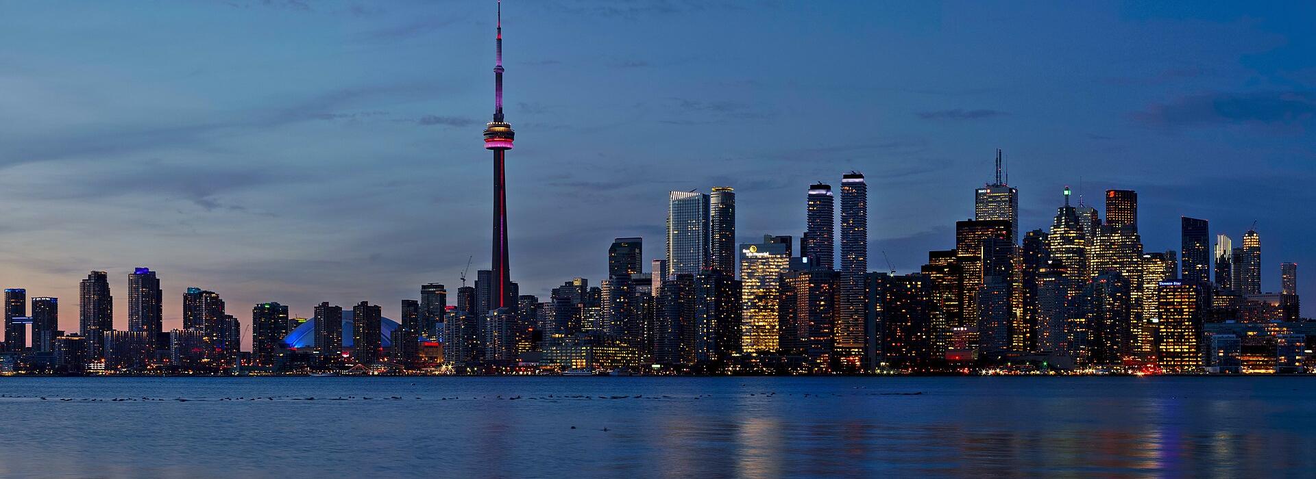 Toronto skyline at dusk seen from Lake Ontario